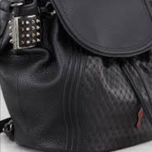 Christian Louboutin
Dompteuse Spiked Backpack